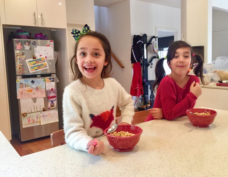 Seven+year+old+twins%2C+Antonia+%28left%29+and+Iliana+%28right%29+eating+cereal+at+home.+Their+mother%2C+Vivian+Papadima%2C+is+concerned+about+what+goes+into+their+food.+Picture%3A+Sofia+Vamvakidou