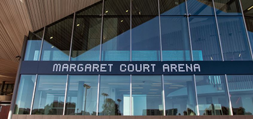 A sign in front of a building