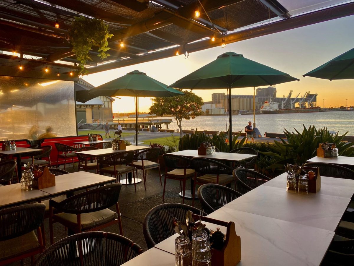 A dining room table in front of a building