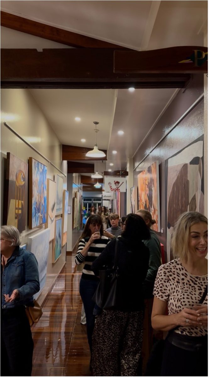 A group of people standing in a room